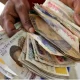  Naira records N6 57 gain against US dollar 