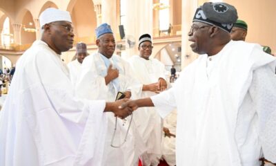  President Tinubu Atiku share warm moment at national mosque in Abuja 