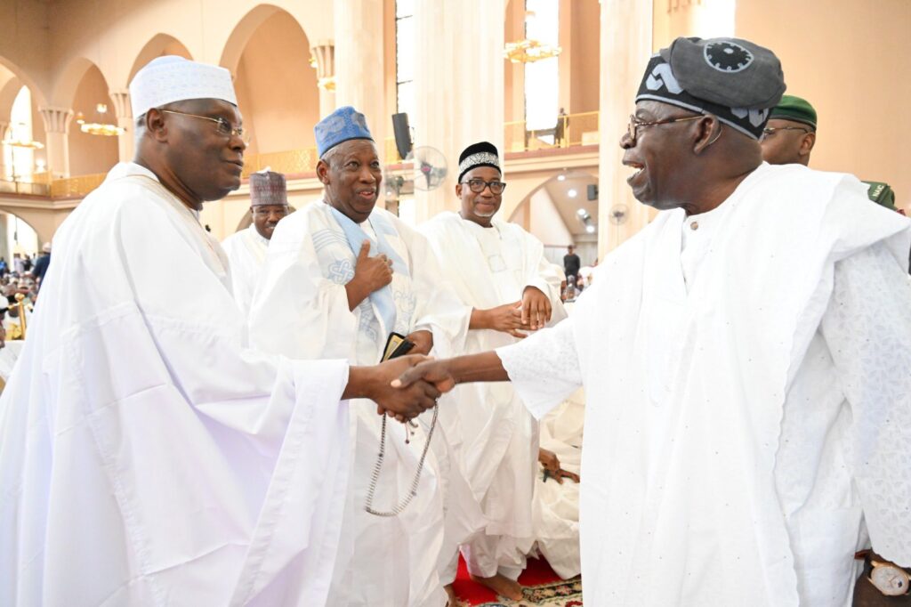 President Tinubu Atiku share warm moment at national mosque in Abuja President Tinubu Atiku share warm moment at national mosque in Abuja
