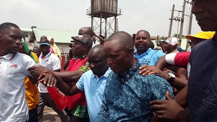Minimum wage protest turns violent in Abuja as NLC chairman escapes attack Minimum wage protest turns violent in Abuja as NLC chairman escapes attack