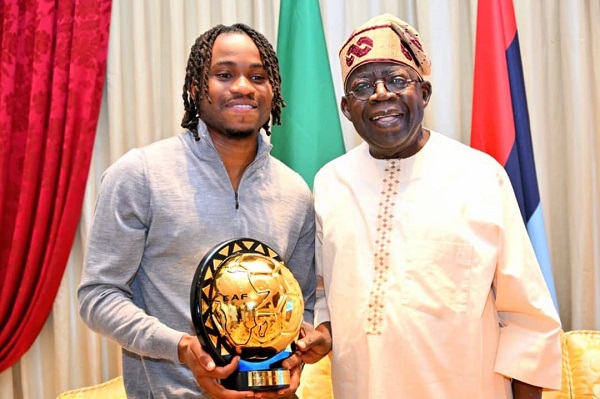 CAF award winner Lookman presents trophy to Tinubu CAF award winner Lookman presents trophy to Tinubu